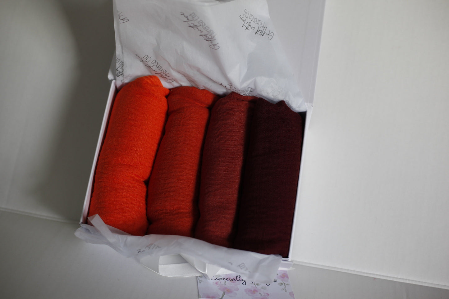 Shades of Orange and maroon crimple scarf with distressed edge, Perfect Eid Hijabs, or if you are gifting hijab gifts, perfectly boxed